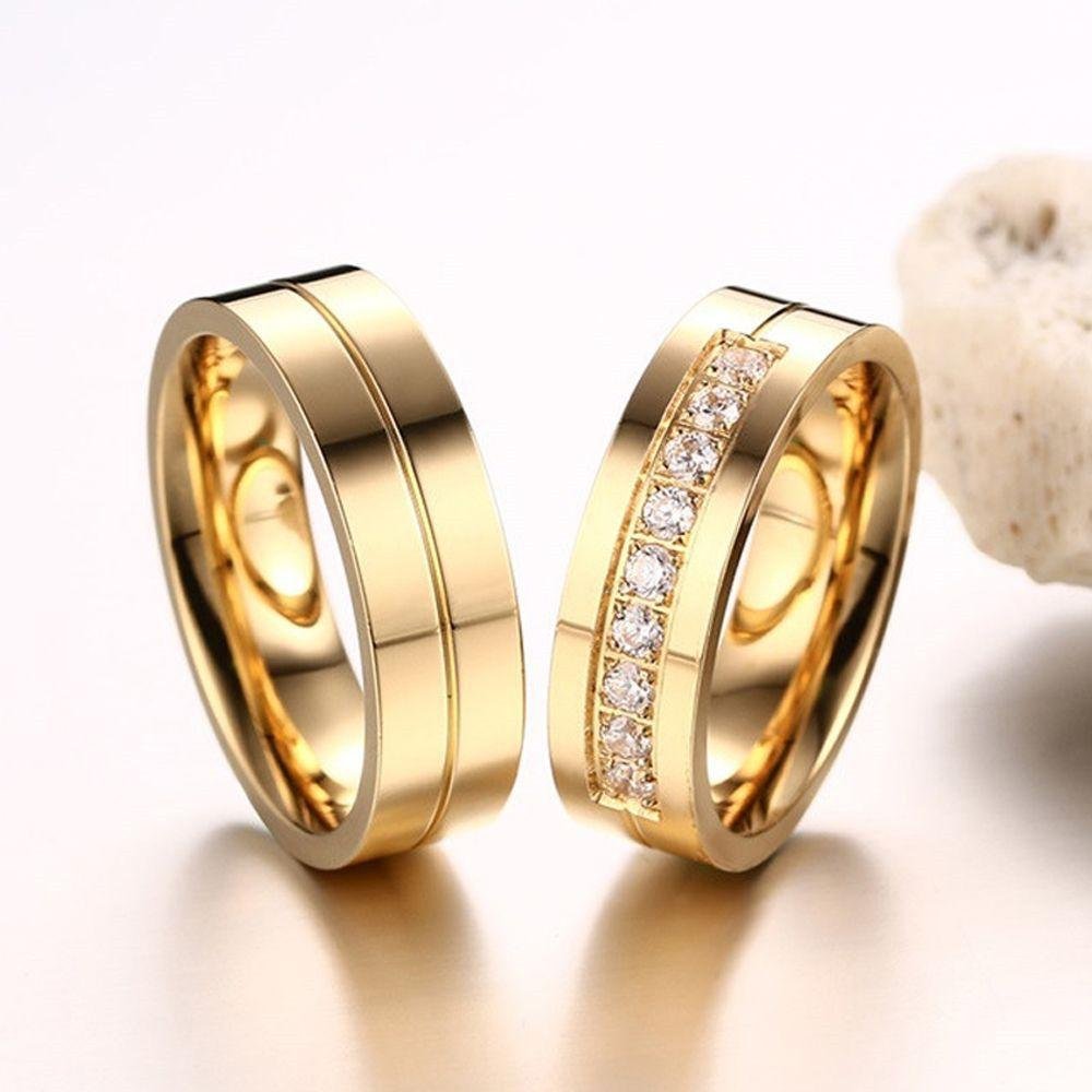 Обручальные кольца парные золотые на свадьбу