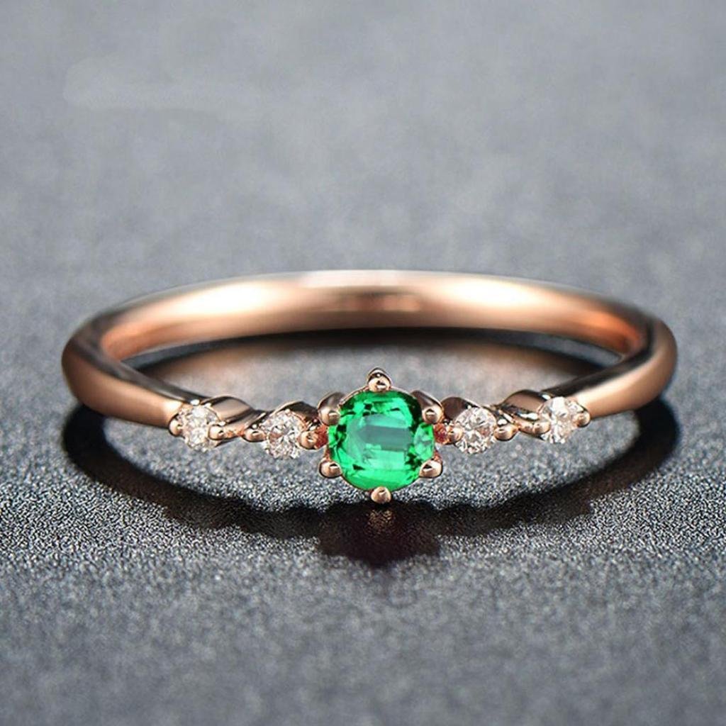 Кольца с зеленым камнем