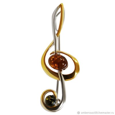 Золотая брошь скрипичный ключ